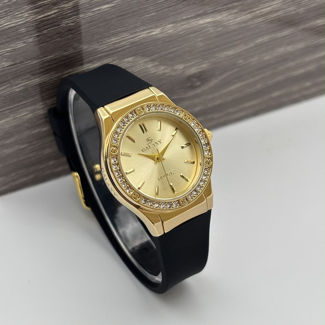 Montre Galaxy bracelet en silicone noir, cadran or serti de strass